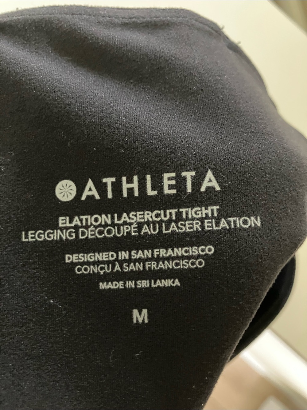 Athleta Black Elation Lasercut Legging - Logo Detail